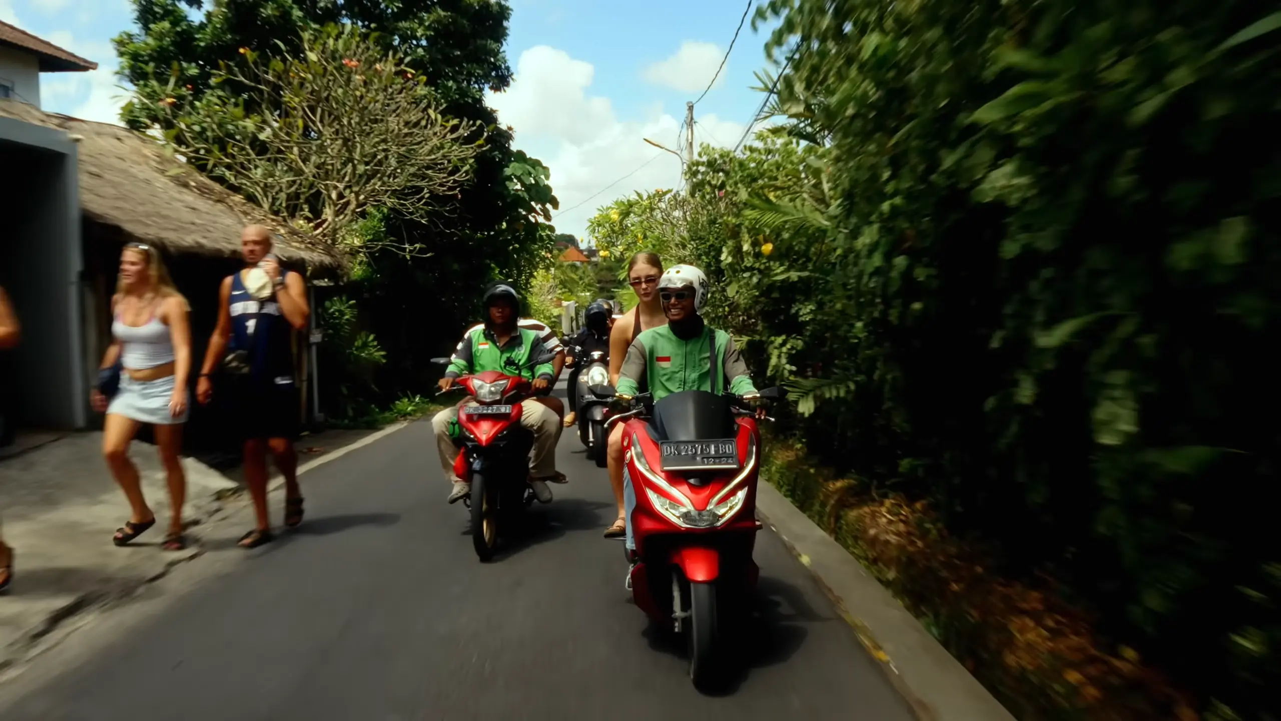 Leon on his motorcycle in Bali traffic